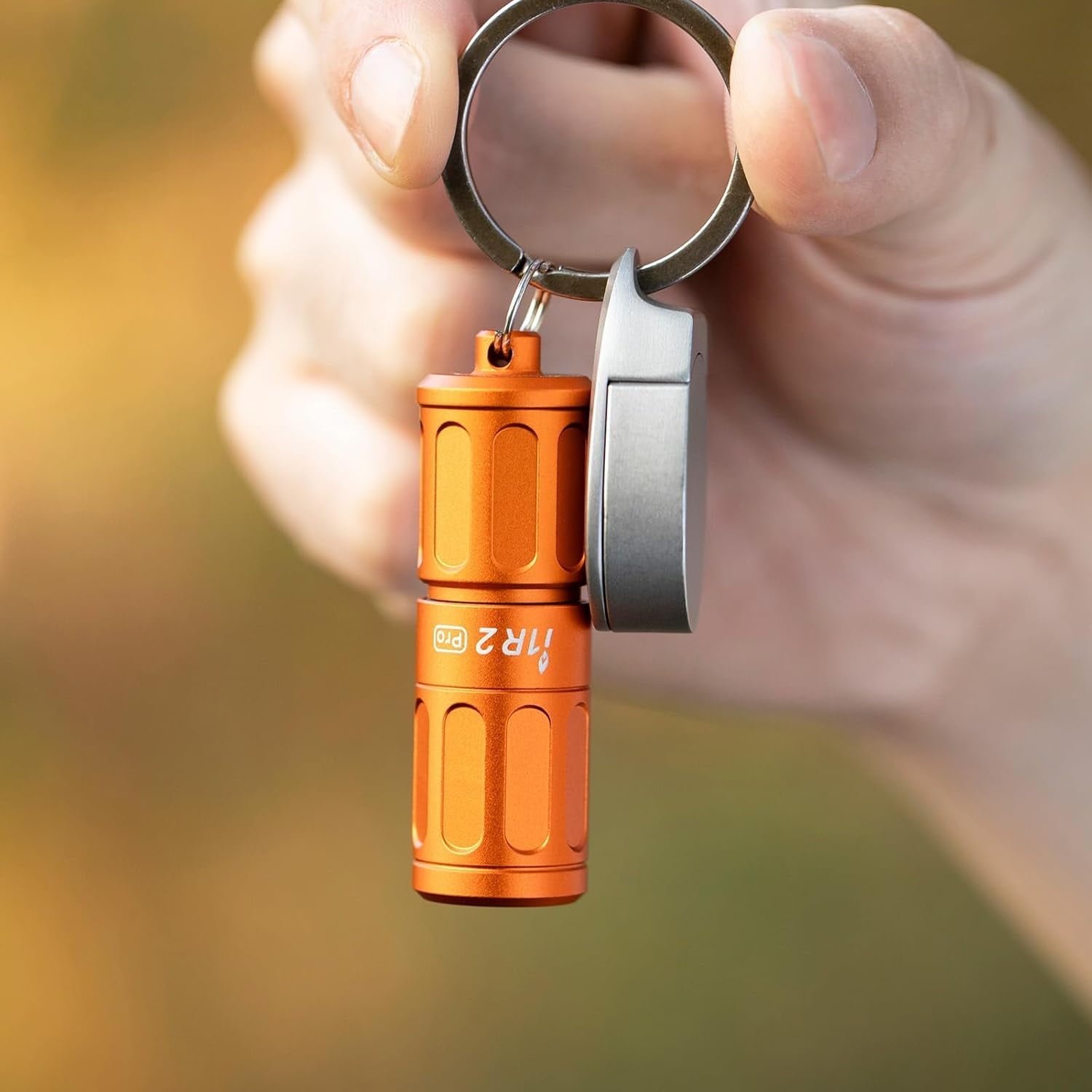 I1R 2 Pro Eos 180 Lumens EDC Rechargeable Keychain Flashlight. (Capsule Orange)